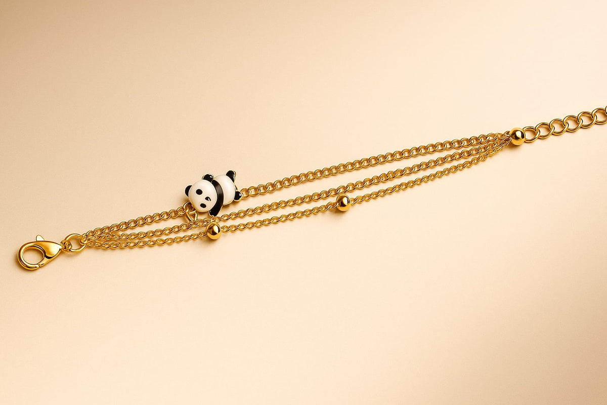 Chic Triple Strand Gold Chain Bracelet with Enamel Panda & Gold Bead Accents