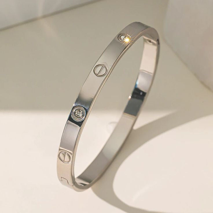 Classic Silver Plated Screw Motif Bangle with Sparkling Zircon Accents
